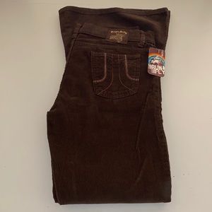Amazing chocolate brown 70s style corduroy bell bottom pants. Made in England.
